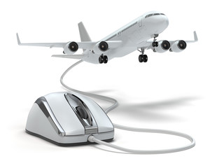 Online booking flight or travel concept. Computer mouse and airp