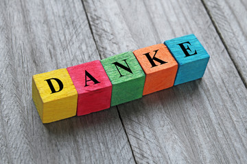word danke (thank you in german) on colorful wooden cubes