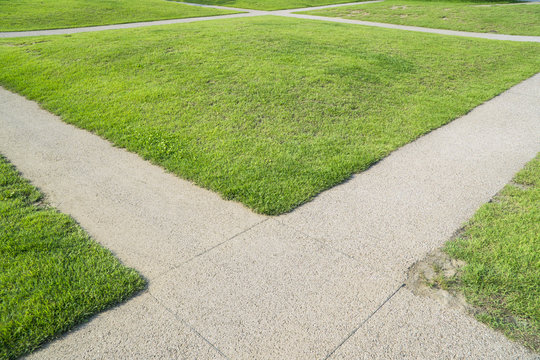 green grass and cross path