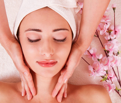 Beautiful young woman getting spa massage