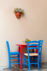 Colorful chairs and table in a cafe in Bozcaada