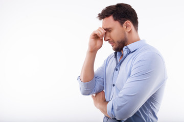 Attractive young man is expressing negative emotions