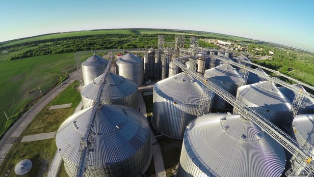 Flight under granaries and elevators in summer - aerial survey