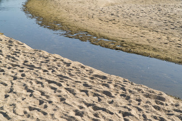 small stream and sand