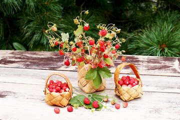 Birch bark basket with wild strawberries