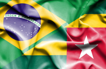 Waving flag of Togo and Brazil