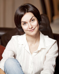 beautiful girl sitting on the couch