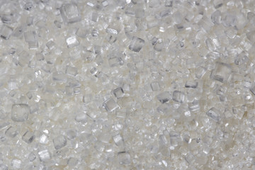 Crystal sugar grains close up