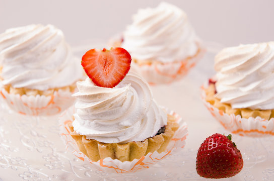 Cake With White Cream And Fresh Strawberries On Stand