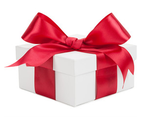 White gift box with red ribbon and bow isolated on a white backg
