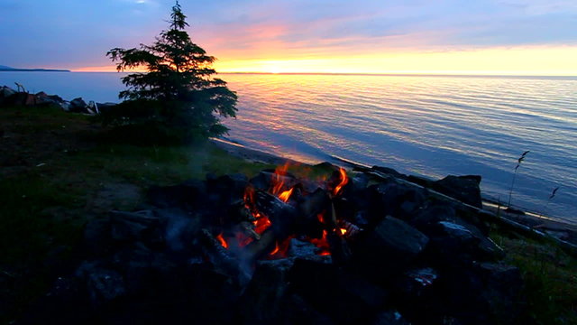 Sunset fire along the beautiful beach of Lake Superior in northern Michigan