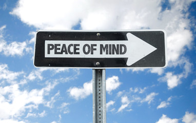 Peace of Mind direction sign with sky background