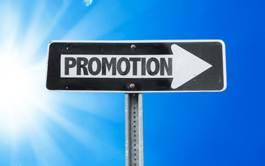 Promotion direction sign with a beautiful day