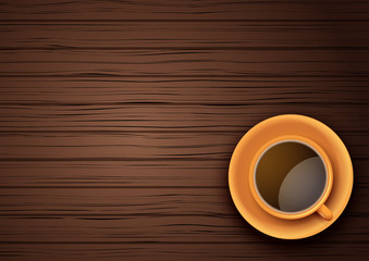 Orange Cup of coffee or tea on the table dark wood