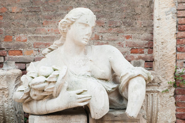 White stone statues and sculptures in the external courtyard of the olimpic theater in Vicenza