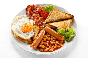 English breakfast - toast, egg, bacon and vegetables 