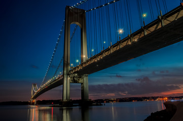 Fototapeta na wymiar The bridge connecting Brooklyn to Staten Island named Verrazano bridge seen at dusk