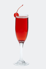 Red coctail with cherry.