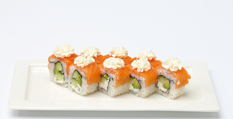 Sushi on white plate.