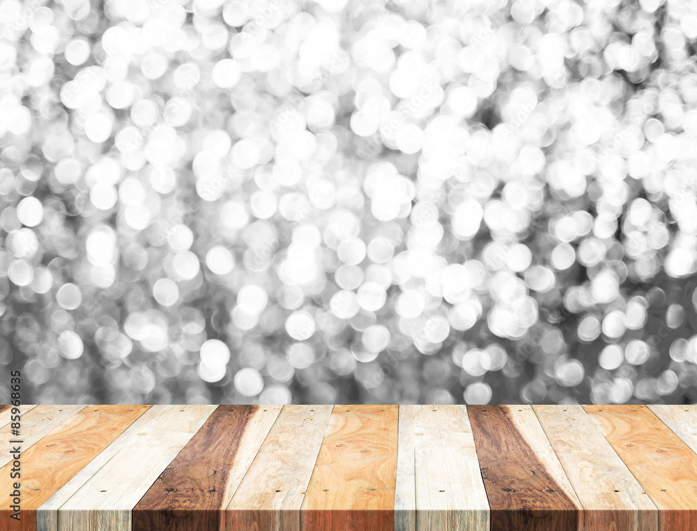 Aufkleber Empty perspective wood table with sparkling bokeh wall ,Template