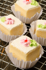 Vanilla cream cake arranged on the rack