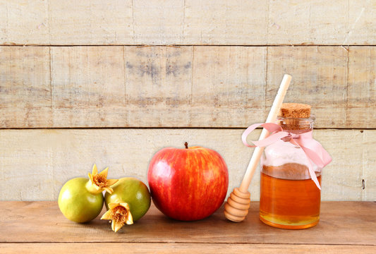 rosh hashanah (jewesh holiday) concept - honey, apple