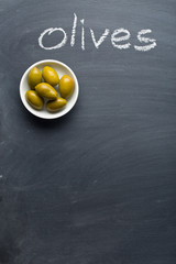 green olives on blackboard