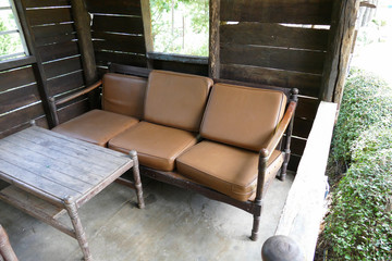 old brown wooden sofa