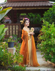 Obraz na płótnie Canvas Thai Woman In Traditional Costume
