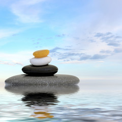 Obraz na płótnie Canvas Zen spa concept background - Zen massage stones reflected in water