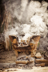 clay stove with burning wood
