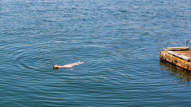 Girl lying in water