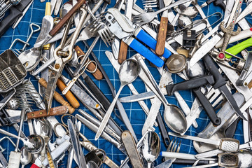 Bundle of old cutlery on flea market stall