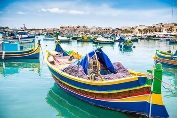 Fototapeta na wymiar boats in Marsaxlokk harbor