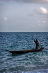 Fototapeta premium old man heading off to the fishing grounds