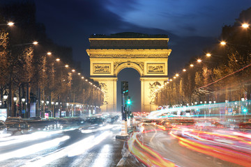 Fototapeta na wymiar Arc De Triomphe and light trails, Paris