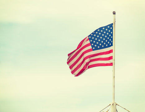 America flag on the sky background