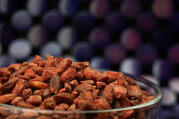 Dried goji berries on the table.