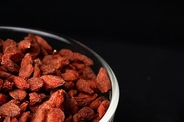 Dried goji berries on the table.