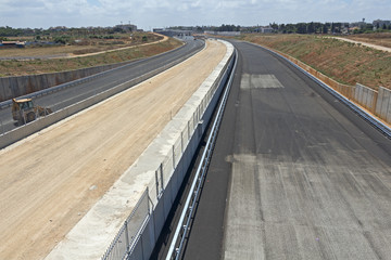Paving a new road.
Laying of new high-speed roads in Israel.
