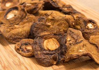 Dried mushrooms on canvas