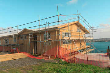 Obraz premium construction of a wooden house with a sea view New Zealand