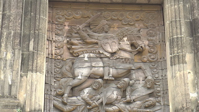 detail of wooden carving depicting saint james, patron of spain at the entrance of fort santiago manila philippines
