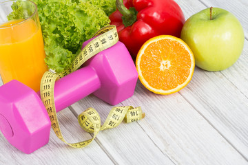 Fitness equipment and healthy food.