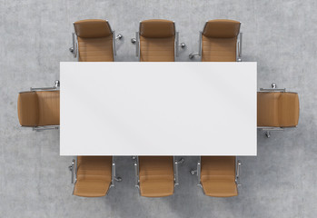 Top view of a conference room. A white rectangular table and eight brown leather chairs around. 3D...