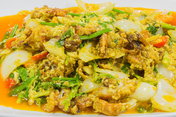 Closeup Fried crab in curry on blue table, Thai food