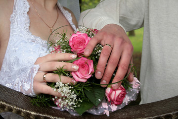 Hands with wedding rings