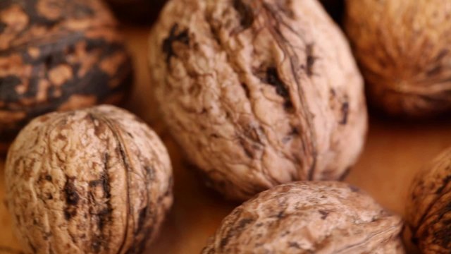 HD 1080 close up: walnut fruits at rotating display