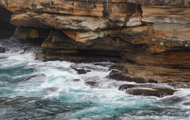 Ocean flows into sea caves
