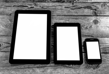 три планшета на старых досках